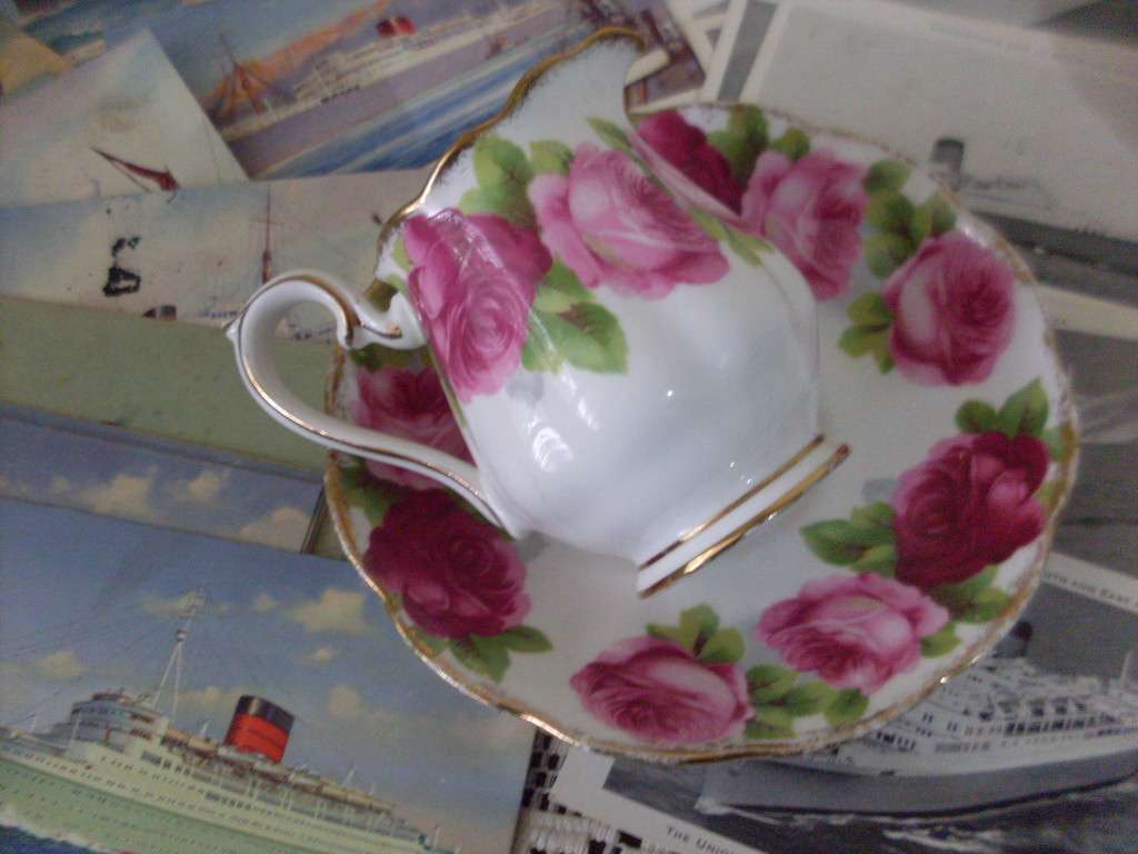 SMALL ROYAL ALBERT MILKJUG AND SAUCER...OLD ENGLISH ROSE PATTERN