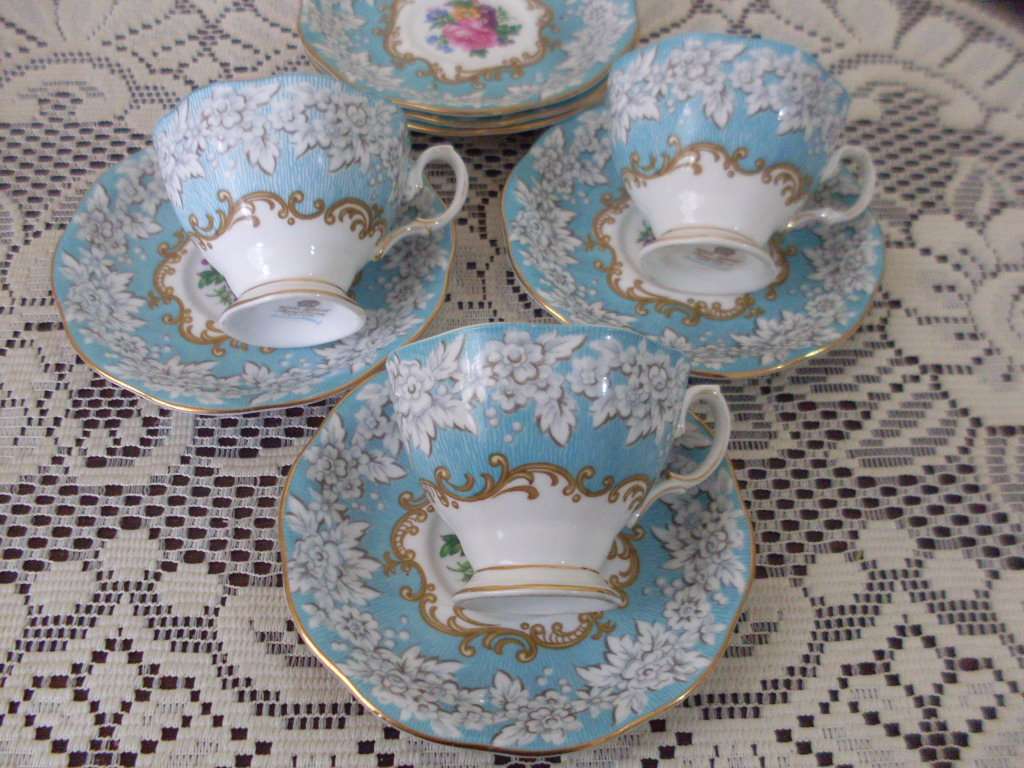 3 ROYAL ALBERT SMALL CUP DUOS AND 3 SPARE SAUCERS...ENCHANTMENT PATTERN