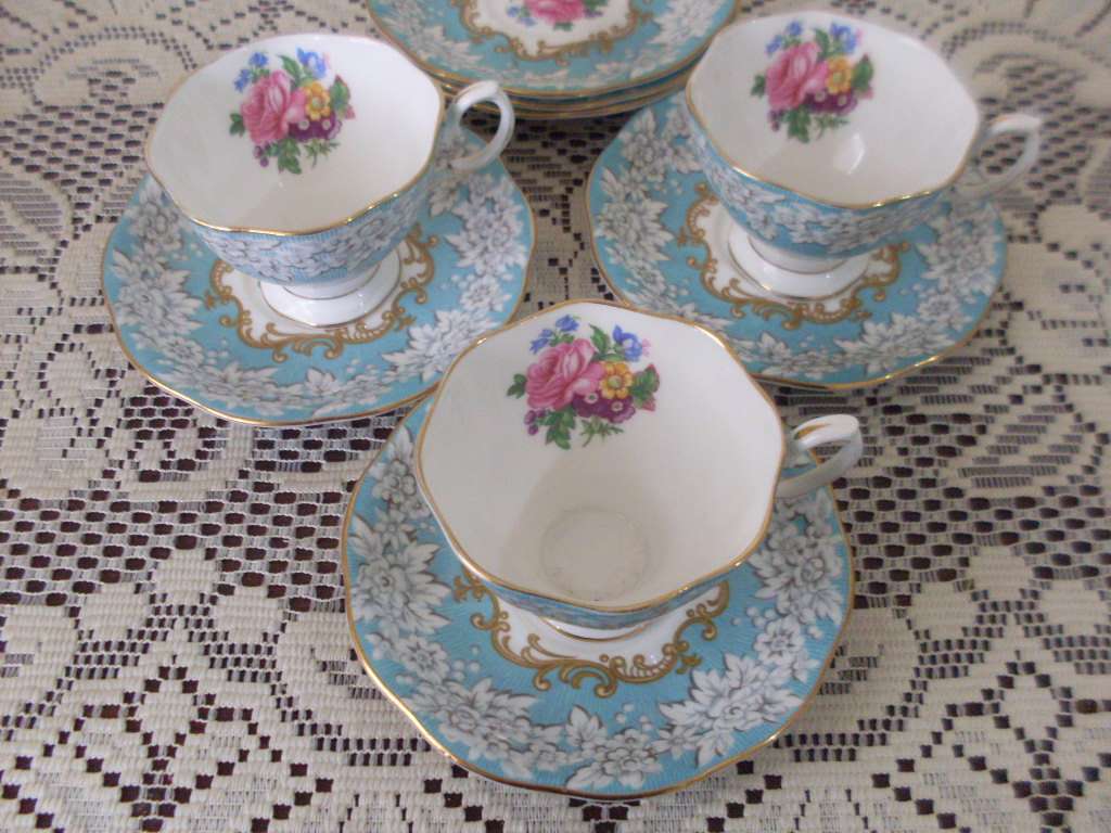 3 ROYAL ALBERT SMALL CUP DUOS AND 3 SPARE SAUCERS...ENCHANTMENT PATTERN