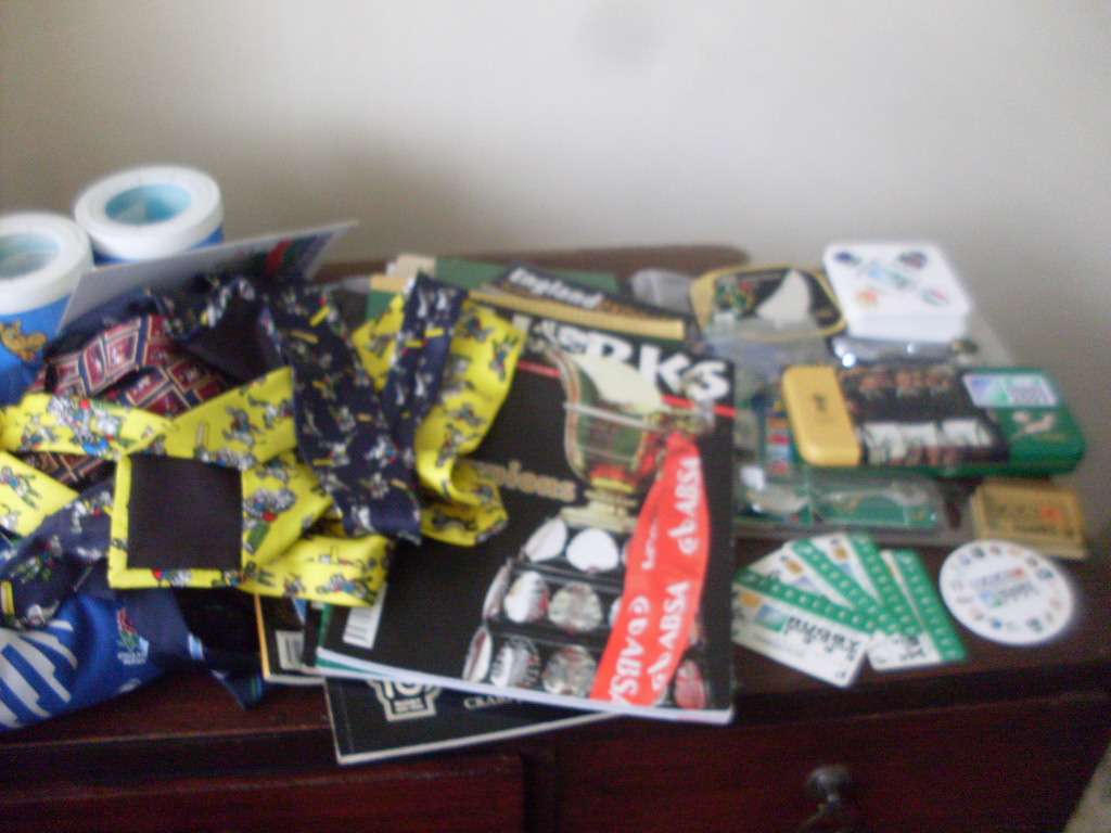 SPORT MEMORABILIA...MOSTLY RUGBY (WC 1995 )AND A FEW CRICKET ITEMS