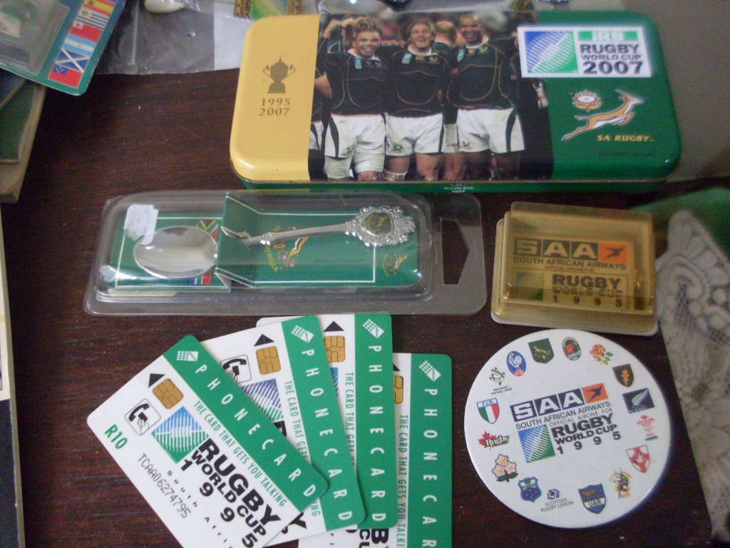 SPORT MEMORABILIA...MOSTLY RUGBY (WC 1995 )AND A FEW CRICKET ITEMS