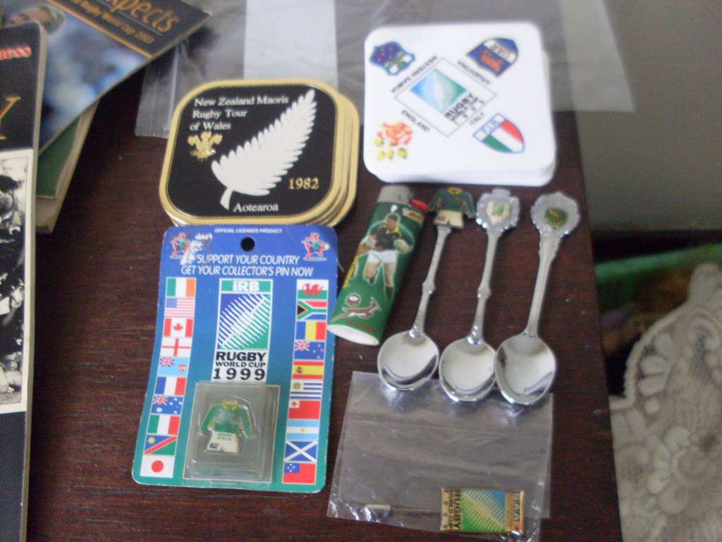 SPORT MEMORABILIA...MOSTLY RUGBY (WC 1995 )AND A FEW CRICKET ITEMS