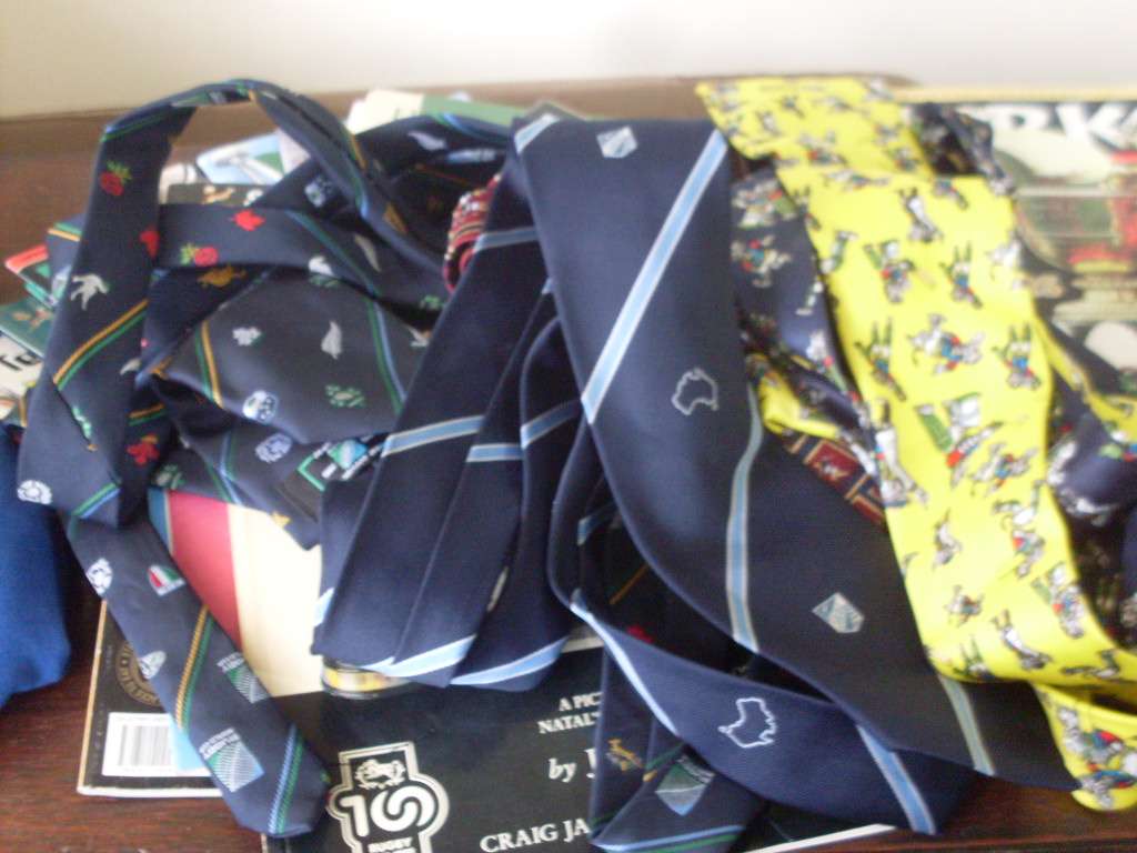 SPORT MEMORABILIA...MOSTLY RUGBY (WC 1995 )AND A FEW CRICKET ITEMS