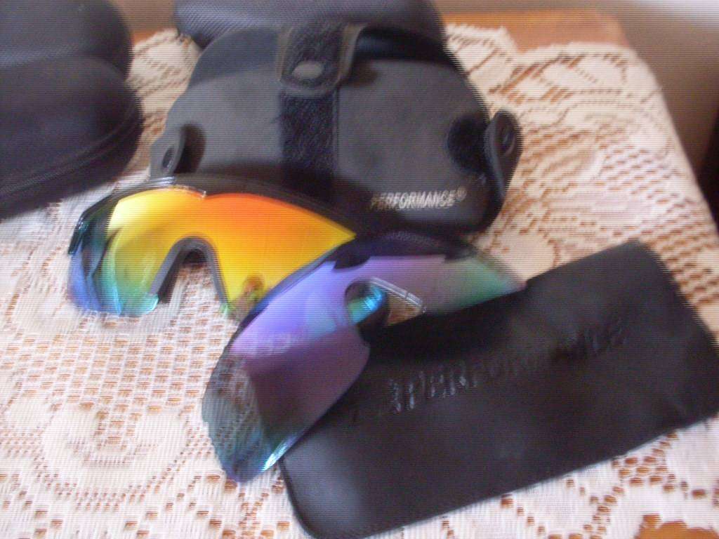 4 PAIRS SUNGLASSES IN CASES ...VARIOUS CONDITION