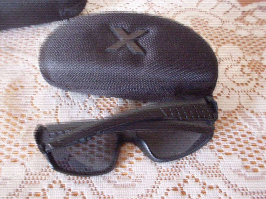 4 PAIRS SUNGLASSES IN CASES ...VARIOUS CONDITION