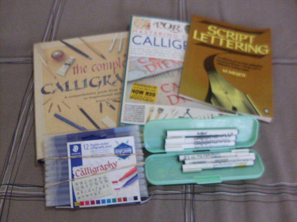 CALIGRAPHY BOOKS AND PENS