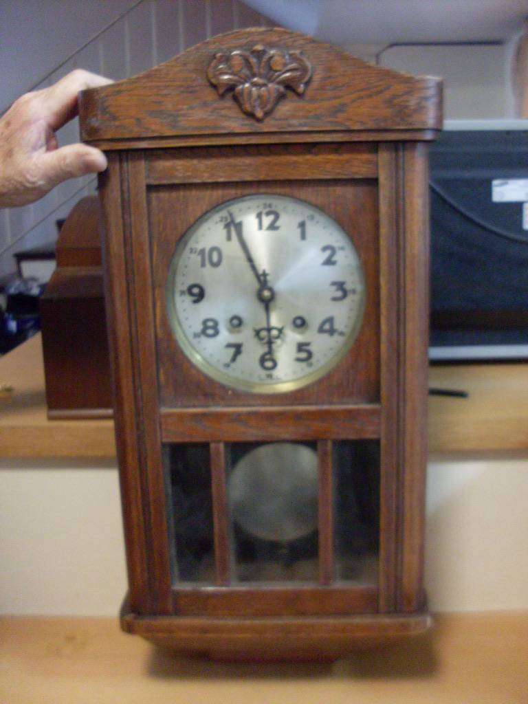 RARE SMALL GERMAN JUNGHANS WALL CLOCK ...WORKS BUT DOESNT CHIME ...SEE PICS FOR DETAILS