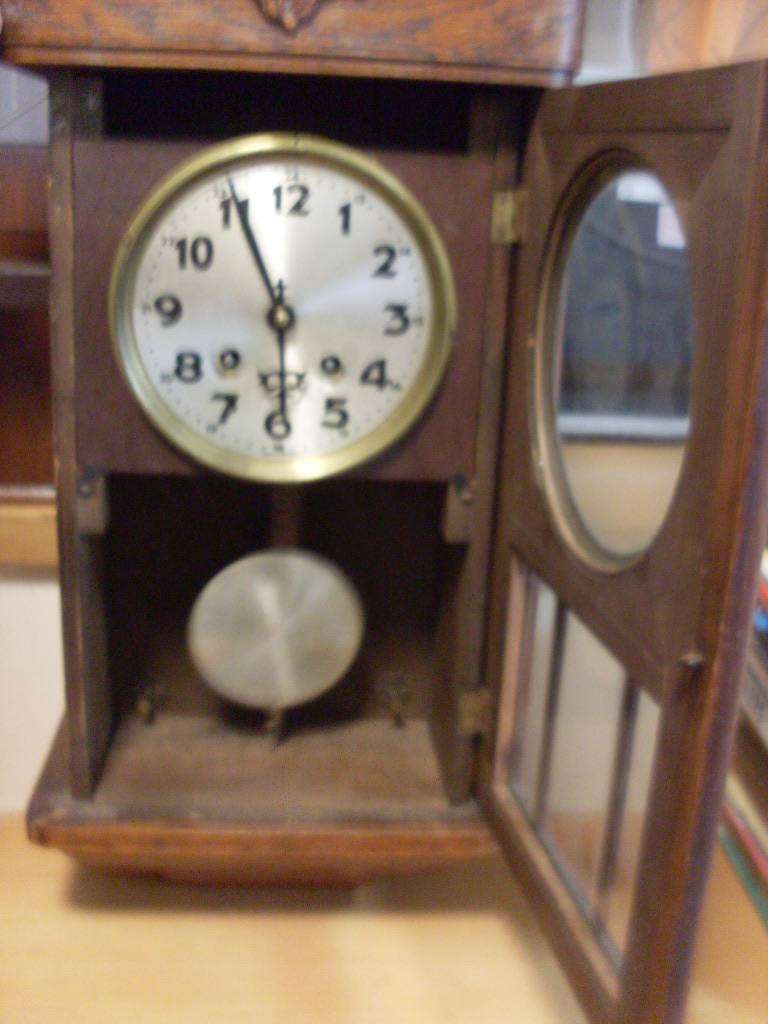 RARE SMALL GERMAN JUNGHANS WALL CLOCK ...WORKS BUT DOESNT CHIME ...SEE PICS FOR DETAILS