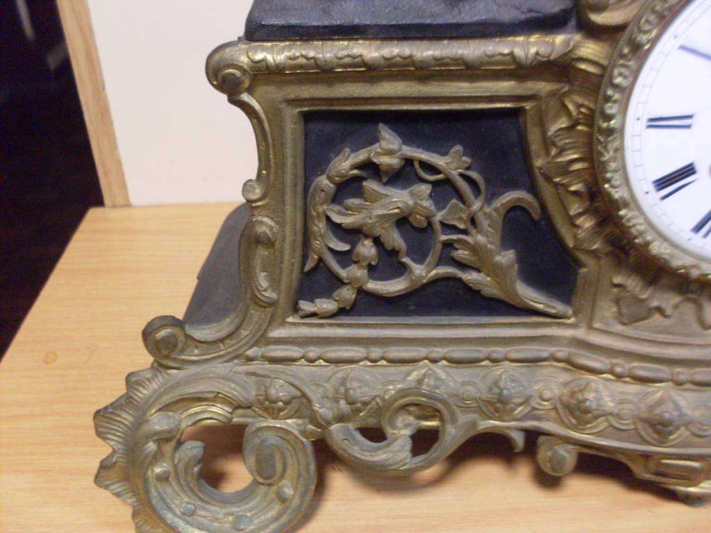 VINTAGE CAST IRON MANTLE CLOCK (FRENCH ?????) WITH SEATED LADY...SEE DESCRIPTION