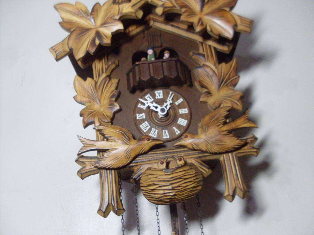 UNUSUAL VINTAGE CUCKOO CLOCK....SCHNEIDER/SOHNE/REGULA/W GERMAN/SWISS MUSICAL MOVEMENT