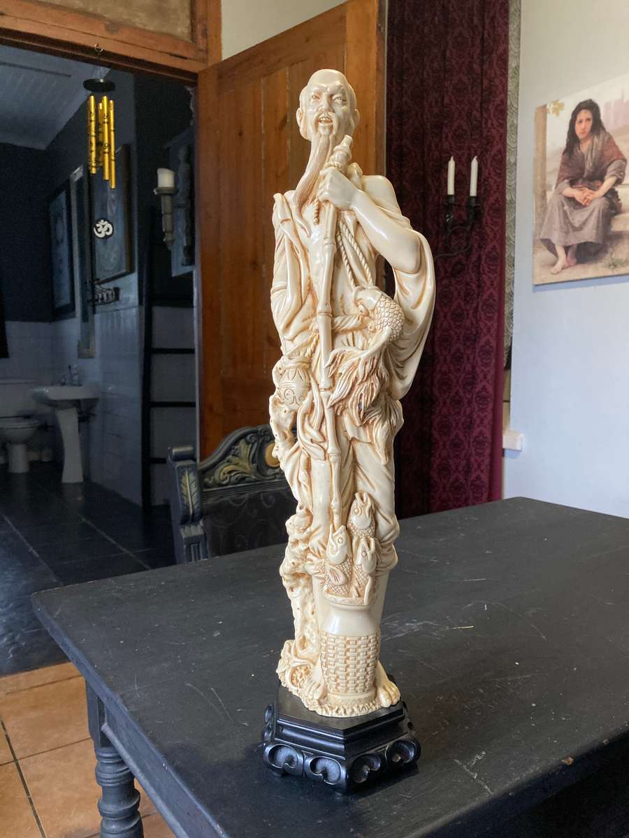 VERY LARGE ORIENTAL  ALABASTER RESIN STATUE OF A FISHERMAN