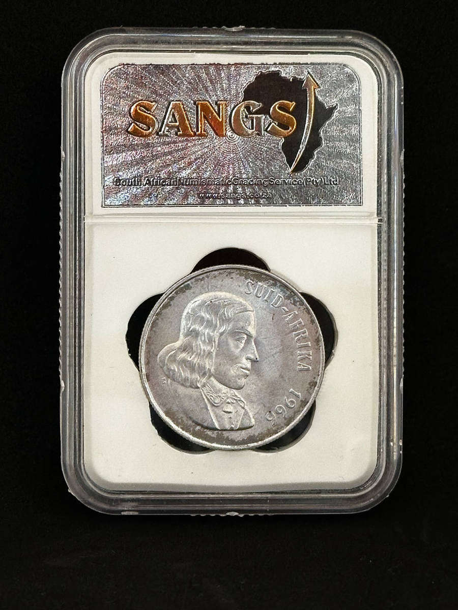 Uncirculated 1966 Tagged Ear Silver R1 - Graded MS61
