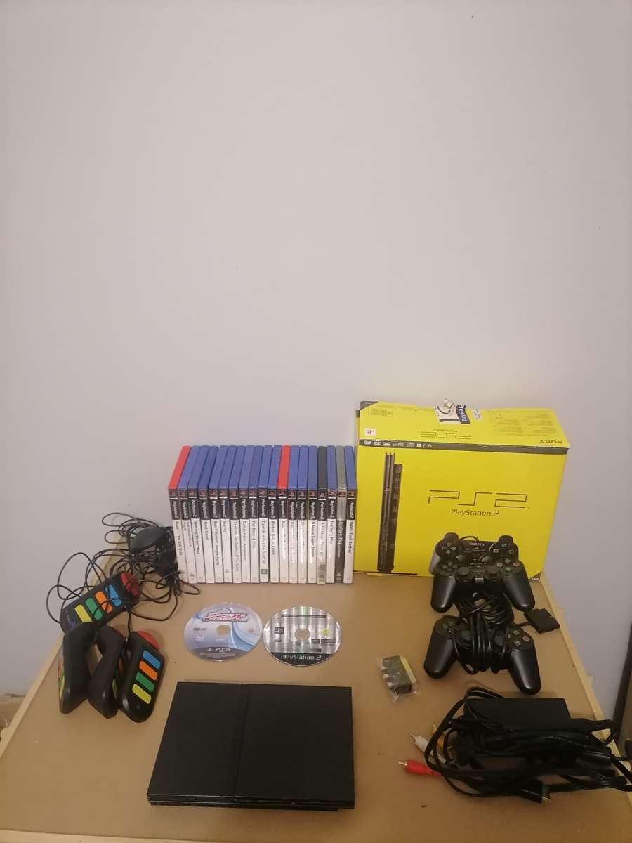 PS2 BUNDLE - CONSOLE - 2 x REMOTES AND 21 PS2 GAMES - 100% ORIGINAL - 100% WORKING LIKE NEW