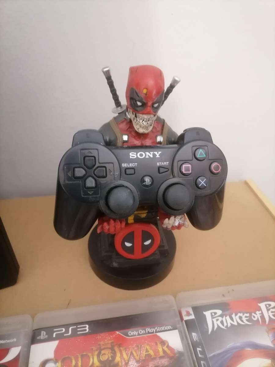 PS3 Bundle - Console 320 GB with Remote & Marvel Cable Guy: Deadpool Zombie Stand & 10 Games