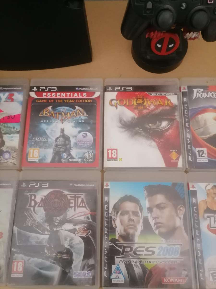 PS3 Bundle - Console 320 GB with Remote & Marvel Cable Guy: Deadpool Zombie Stand & 10 Games