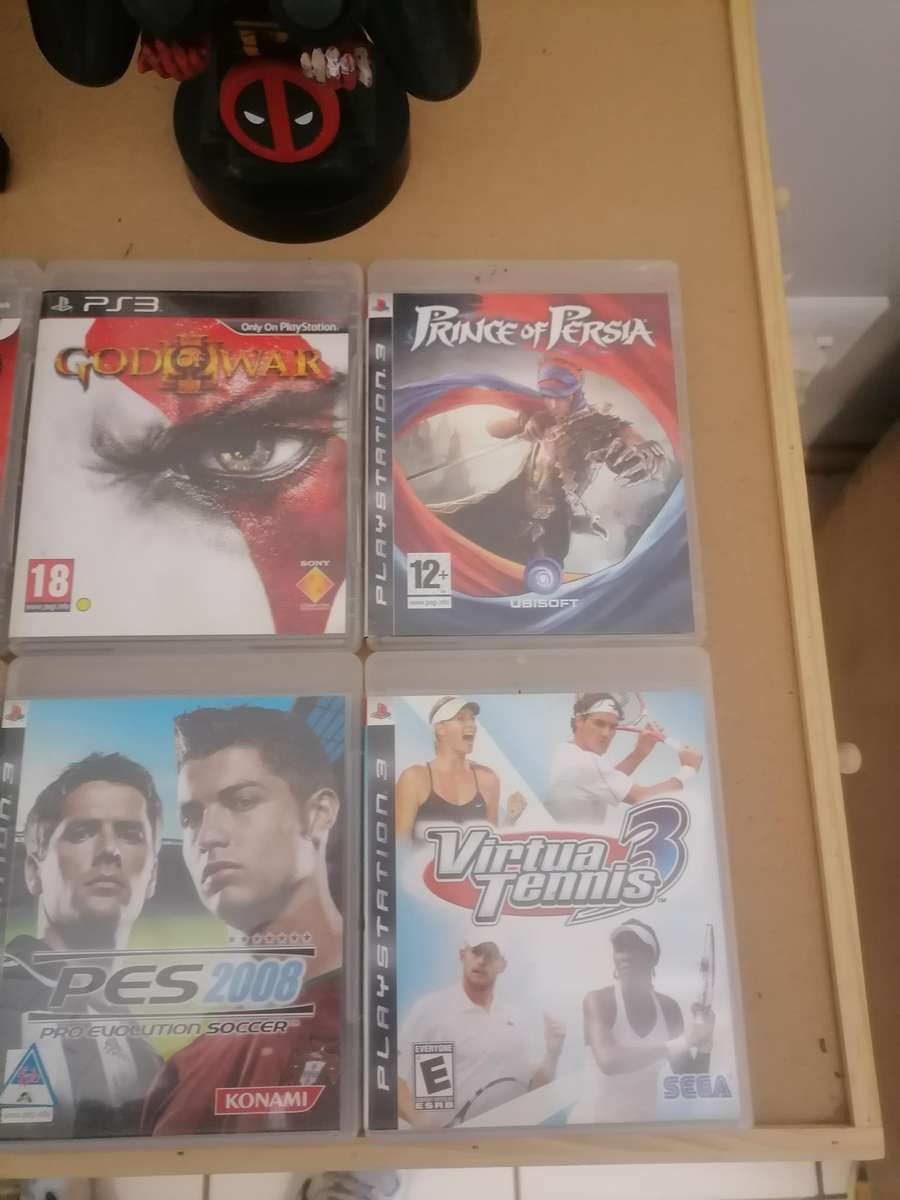 PS3 Bundle - Console 320 GB with Remote & Marvel Cable Guy: Deadpool Zombie Stand & 10 Games