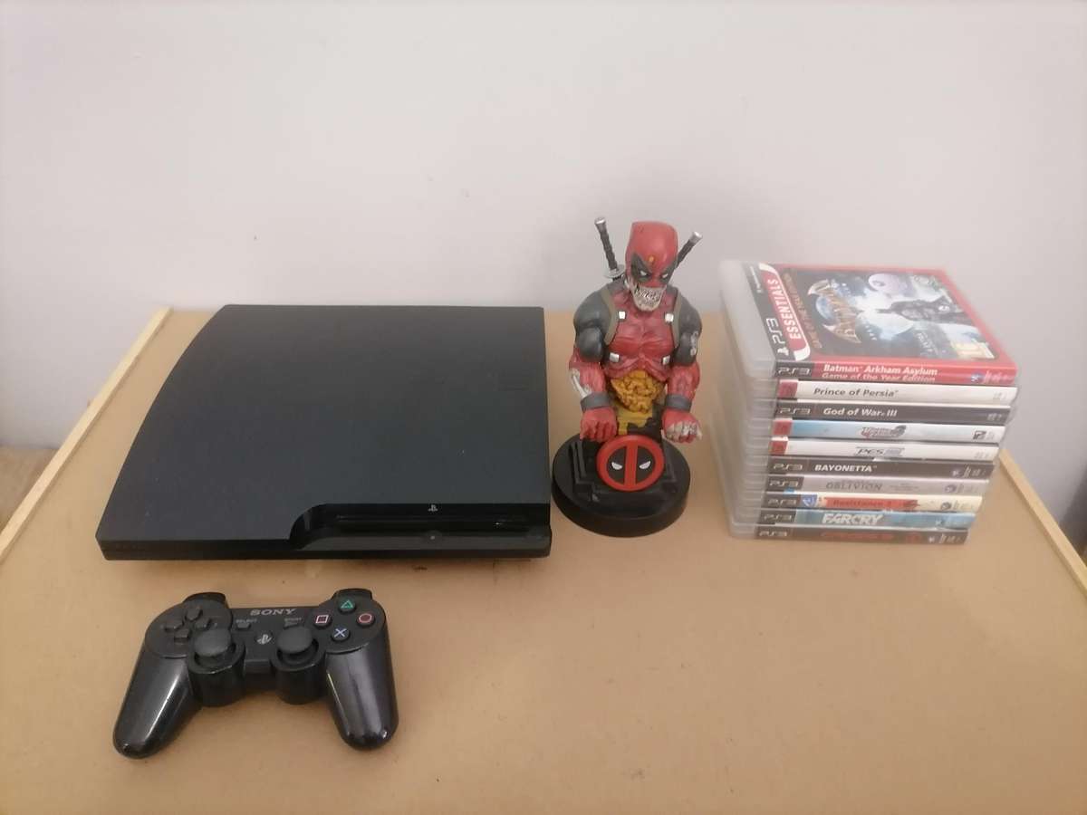 PS3 Bundle - Console 320 GB with Remote & Marvel Cable Guy: Deadpool Zombie Stand & 10 Games