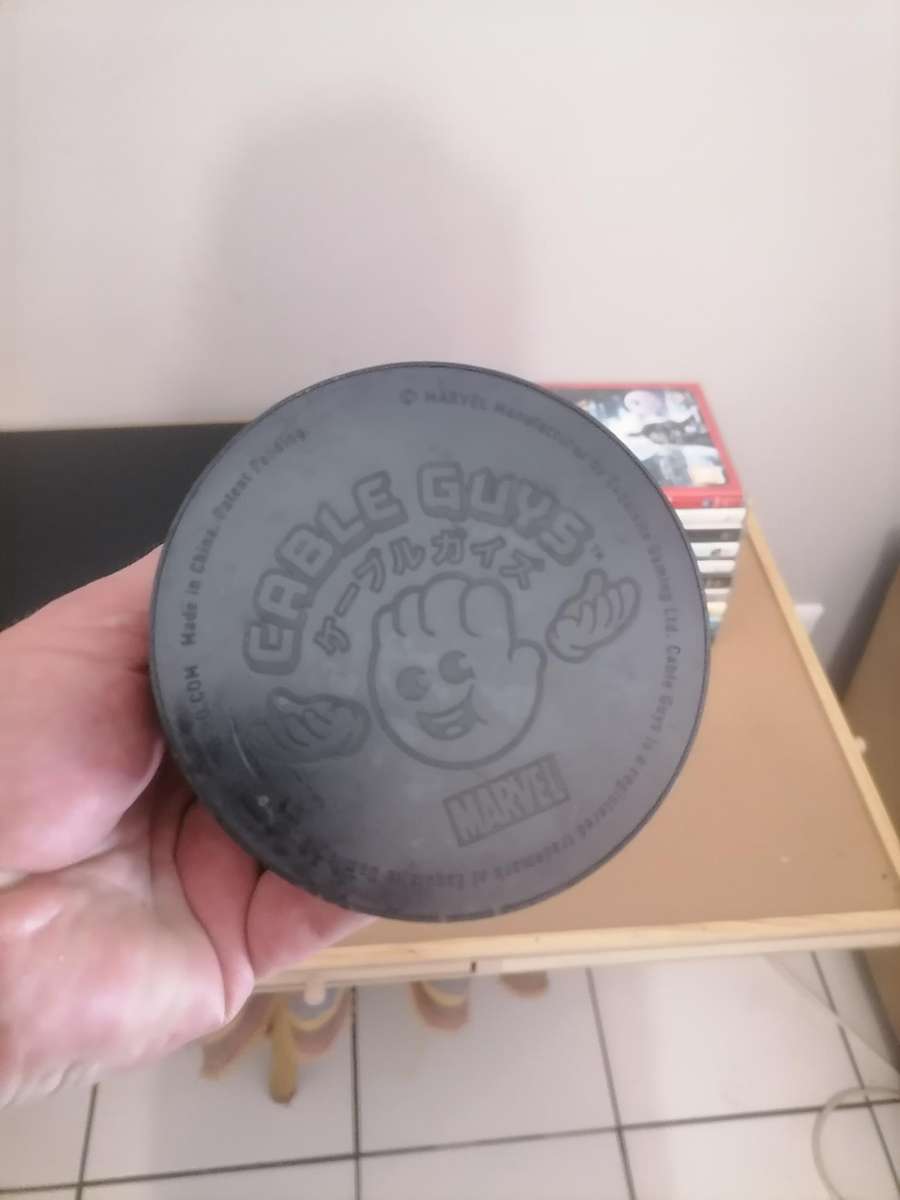 PS3 Bundle - Console 320 GB with Remote & Marvel Cable Guy: Deadpool Zombie Stand & 10 Games