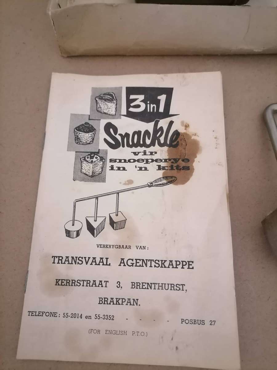 Vintage Snackle Iron set, a kitchen tool used to make deep-fried treats like fritters or rosettes