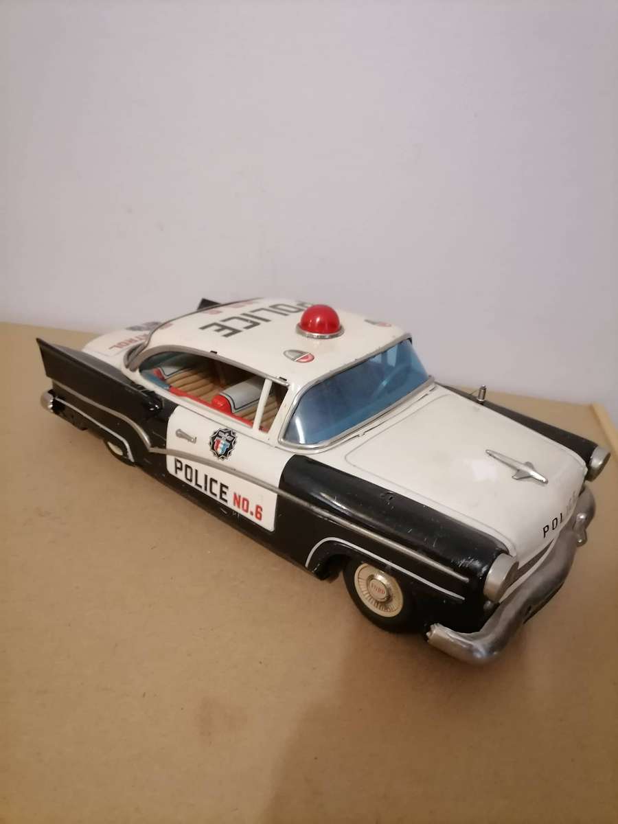 1957 FORD JAPANESE TIN POLICE CAR BY YONEZAWA NR FRICTION MECHANISM STILL WORKS 38 CM L X 17 CM B
