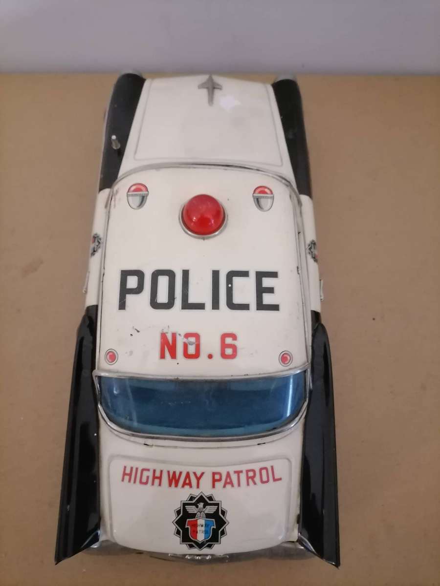 1957 FORD JAPANESE TIN POLICE CAR BY YONEZAWA NR FRICTION MECHANISM STILL WORKS 38 CM L X 17 CM B