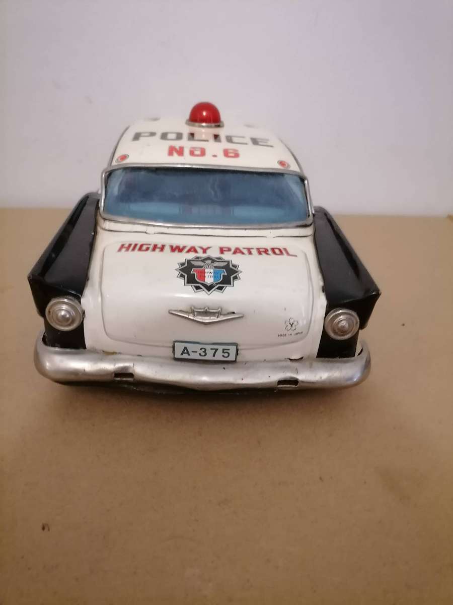 1957 FORD JAPANESE TIN POLICE CAR BY YONEZAWA NR FRICTION MECHANISM STILL WORKS 38 CM L X 17 CM B