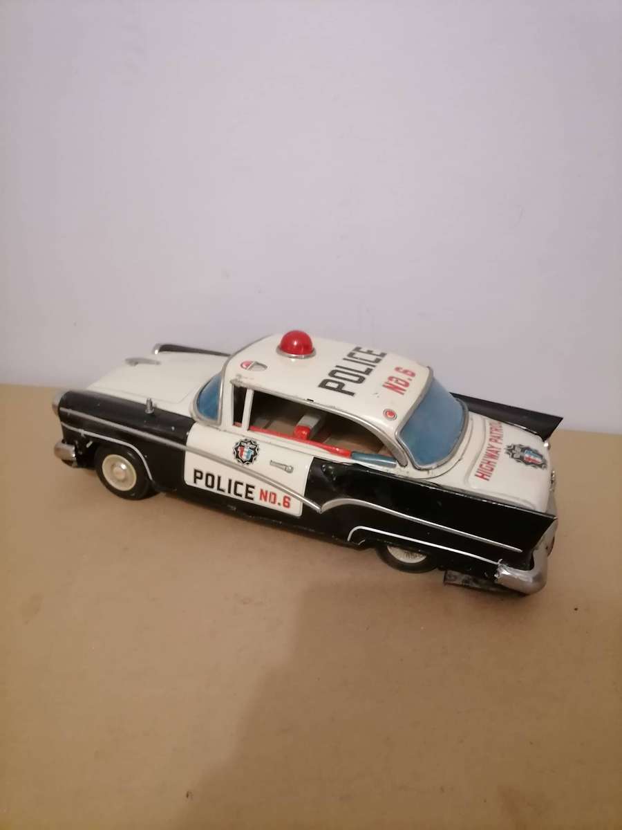1957 FORD JAPANESE TIN POLICE CAR BY YONEZAWA NR FRICTION MECHANISM STILL WORKS 38 CM L X 17 CM B