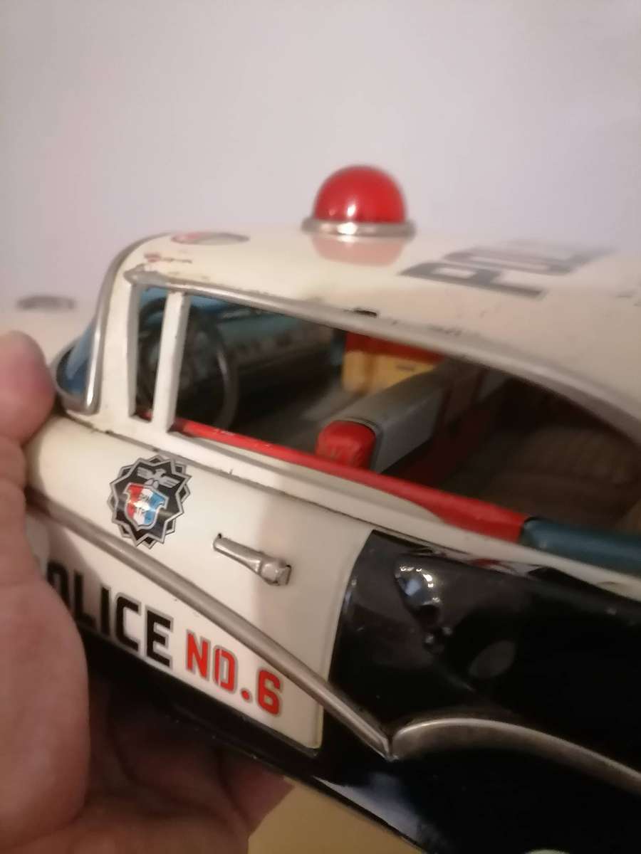 1957 FORD JAPANESE TIN POLICE CAR BY YONEZAWA NR FRICTION MECHANISM STILL WORKS 38 CM L X 17 CM B