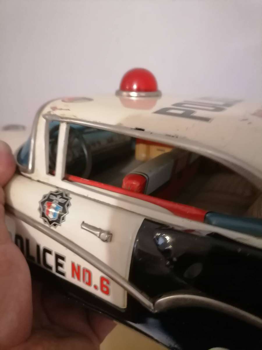 1957 FORD JAPANESE TIN POLICE CAR BY YONEZAWA NR FRICTION MECHANISM STILL WORKS 38 CM L X 17 CM B