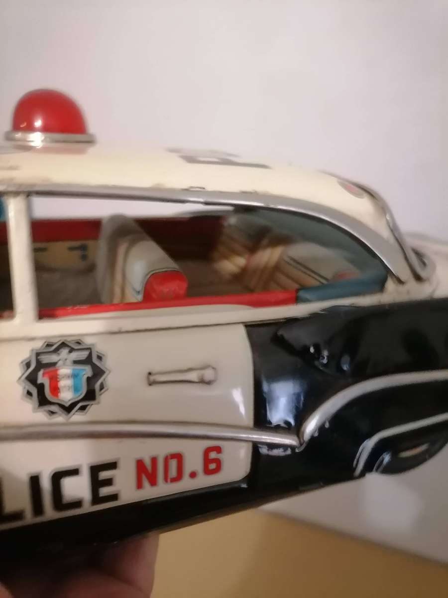 1957 FORD JAPANESE TIN POLICE CAR BY YONEZAWA NR FRICTION MECHANISM STILL WORKS 38 CM L X 17 CM B