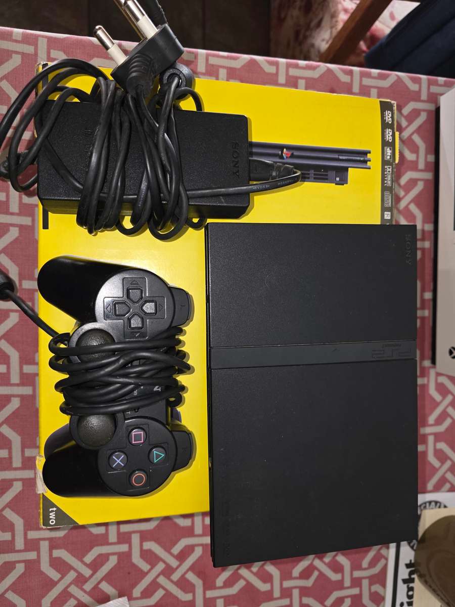 Playstation 2 Slim - complete in box - hardly used, rare find in this condition