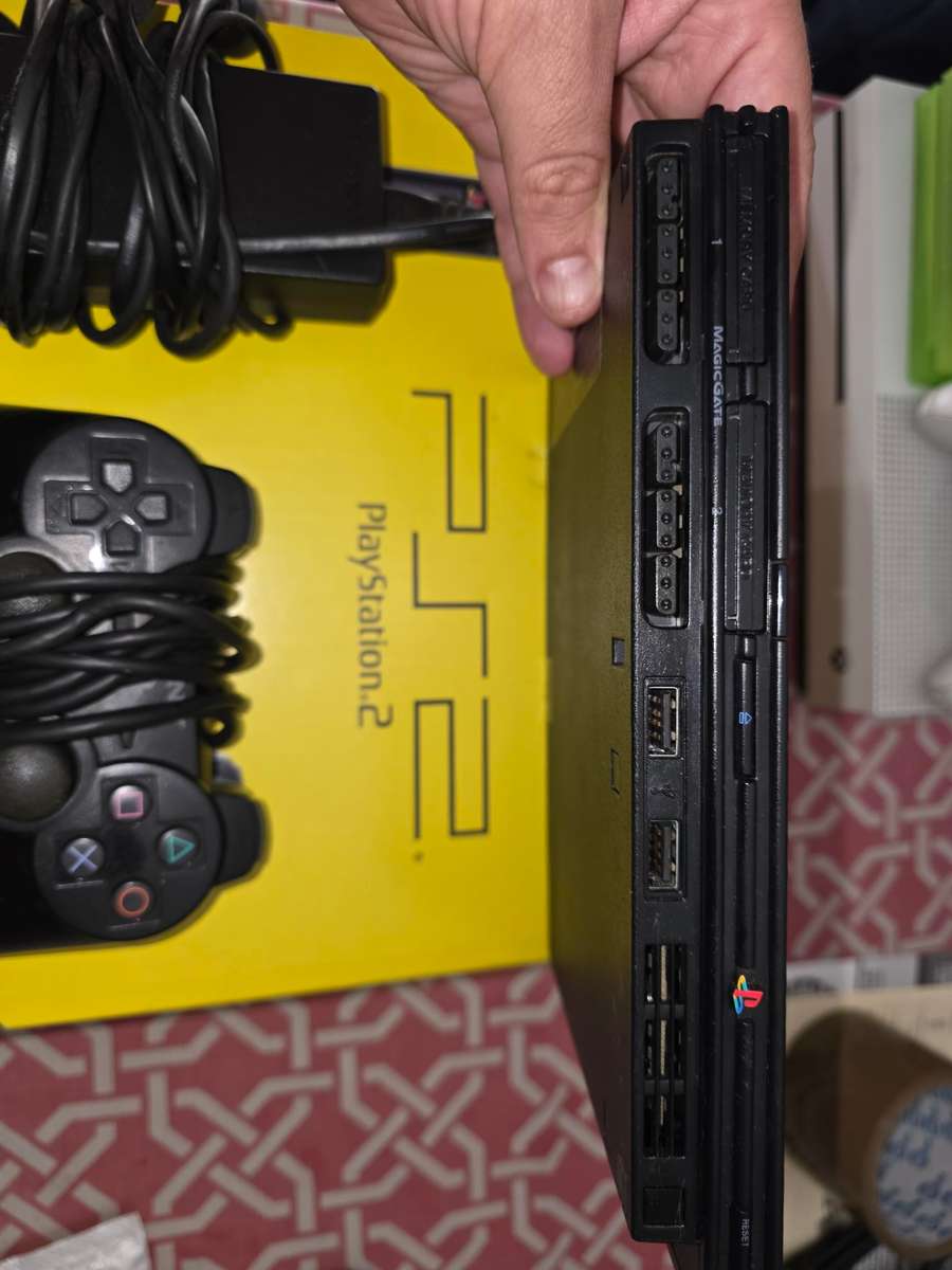 Playstation 2 Slim - complete in box - hardly used, rare find in this condition