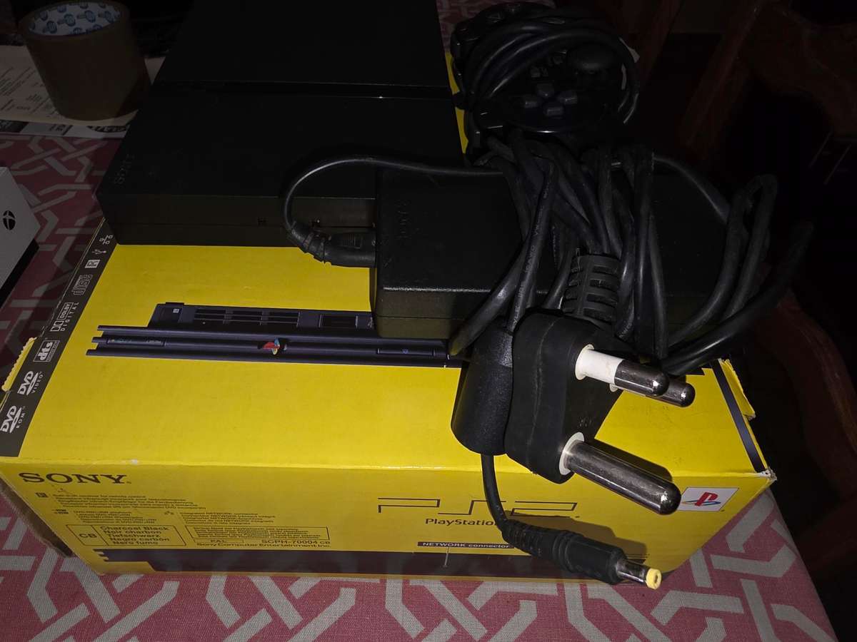 Playstation 2 Slim - complete in box - hardly used, rare find in this condition