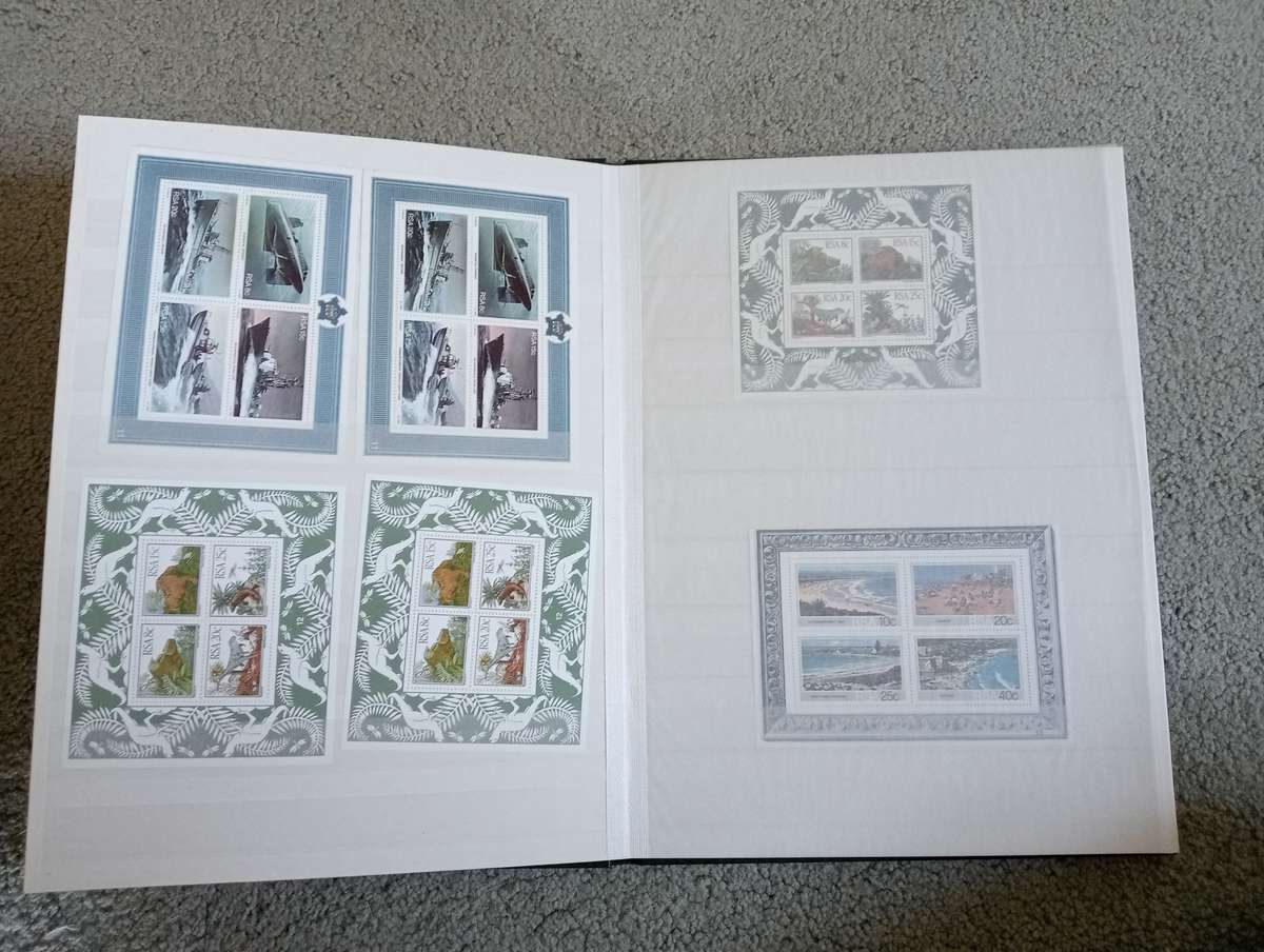 RSA-CLEAN STOCK BOOK FULL OF MINI SHEETS UMM AND CTO SEE BELOW