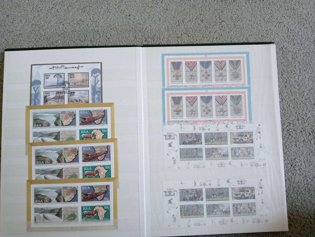 RSA-CLEAN STOCK BOOK FULL OF MINI SHEETS UMM AND CTO SEE BELOW