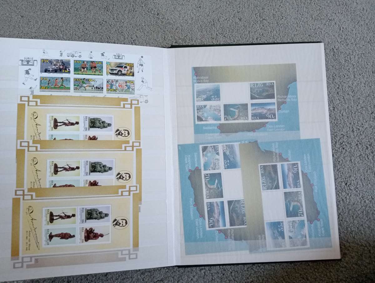 RSA-CLEAN STOCK BOOK FULL OF MINI SHEETS UMM AND CTO SEE BELOW