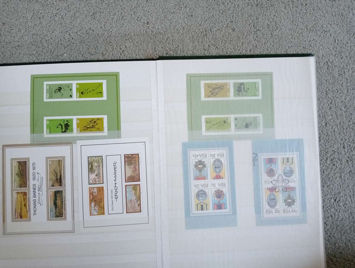 RSA-CLEAN STOCK BOOK FULL OF MINI SHEETS UMM AND CTO SEE BELOW