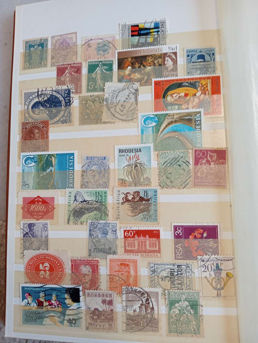 TWO VERY USEFUL STOCK BOOKS-ONE JAMMED WITH WORLD MANY EARLIES,OTHER GOOD CYPRUS SEE BELOW