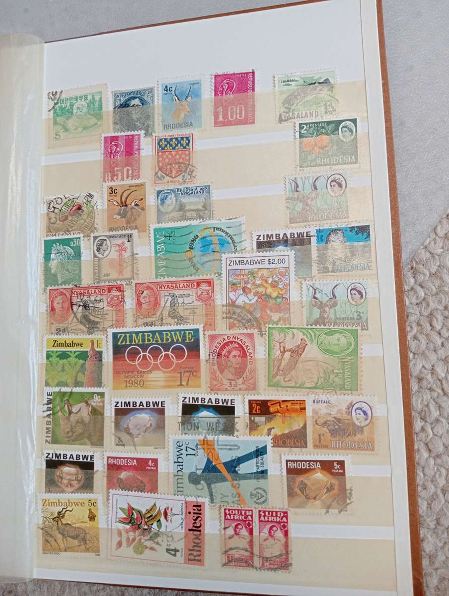 TWO VERY USEFUL STOCK BOOKS-ONE JAMMED WITH WORLD MANY EARLIES,OTHER GOOD CYPRUS SEE BELOW