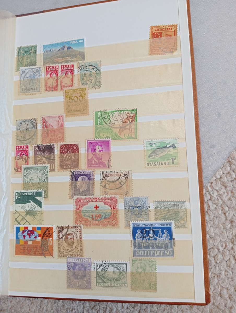 TWO VERY USEFUL STOCK BOOKS-ONE JAMMED WITH WORLD MANY EARLIES,OTHER GOOD CYPRUS SEE BELOW