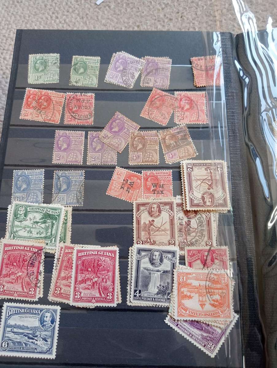 QUALITY STOCK BOOK WITH VALUABLE B.GUIANA,SOLOMON ISL AND MORE-MUST SEE BELOW