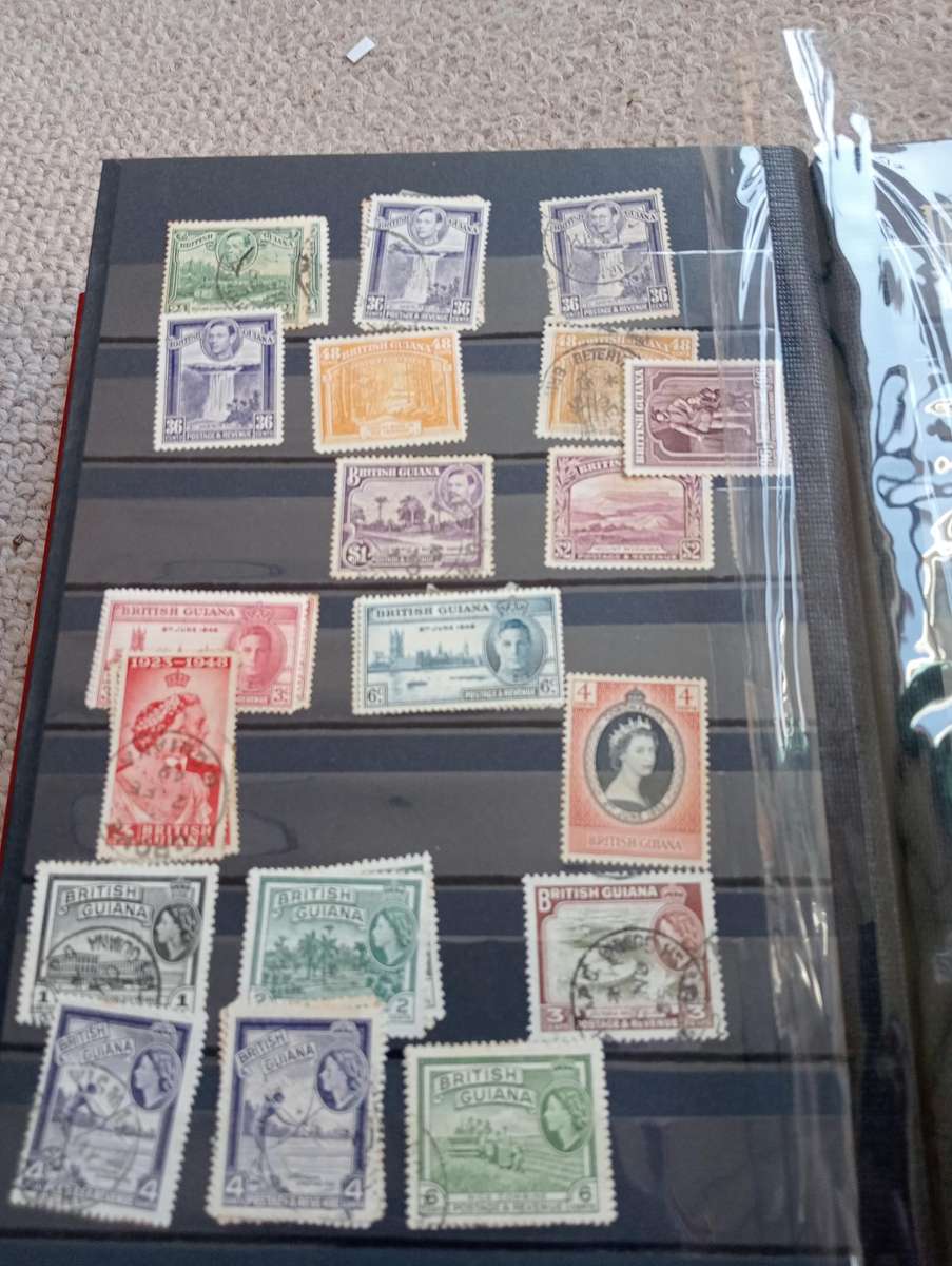 QUALITY STOCK BOOK WITH VALUABLE B.GUIANA,SOLOMON ISL AND MORE-MUST SEE BELOW