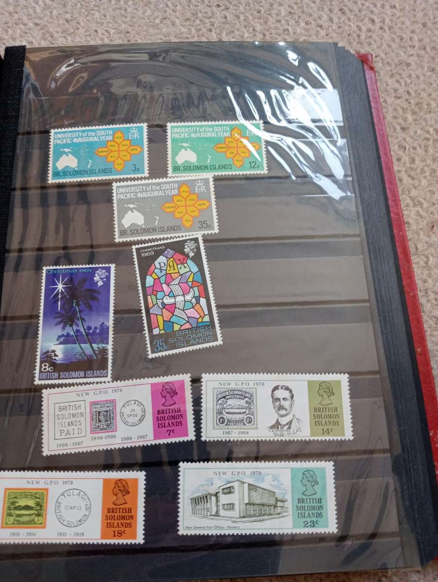 QUALITY STOCK BOOK WITH VALUABLE B.GUIANA,SOLOMON ISL AND MORE-MUST SEE BELOW