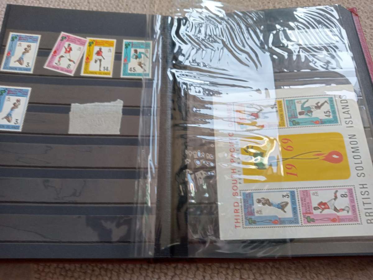 QUALITY STOCK BOOK WITH VALUABLE B.GUIANA,SOLOMON ISL AND MORE-MUST SEE BELOW