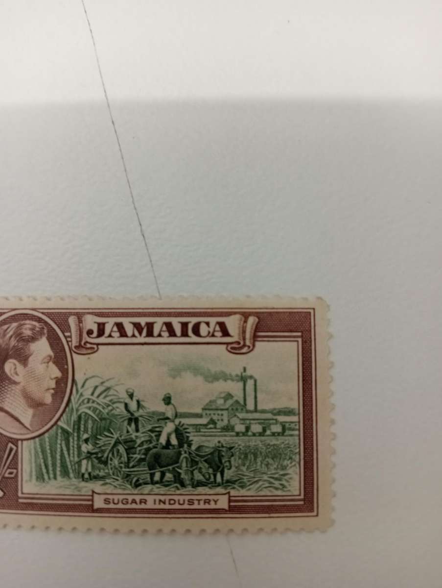 JAMAICA-KGVI RARE RARE      R15 600.00     1st one I have dealt with " REPAIRED CHIMNEY " SG130a