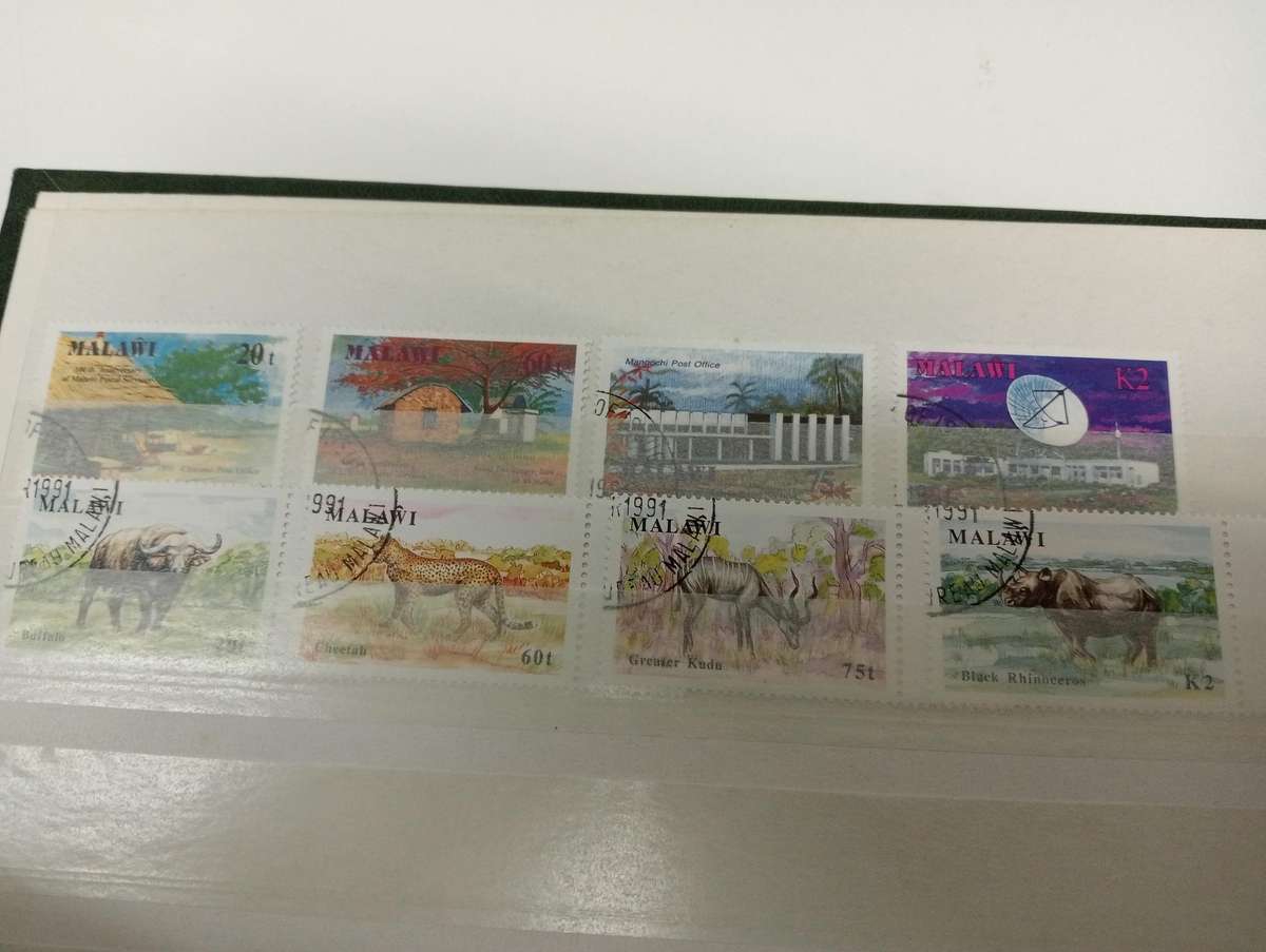 LOVELY CLEAN STOCK BOOK with odds and ends