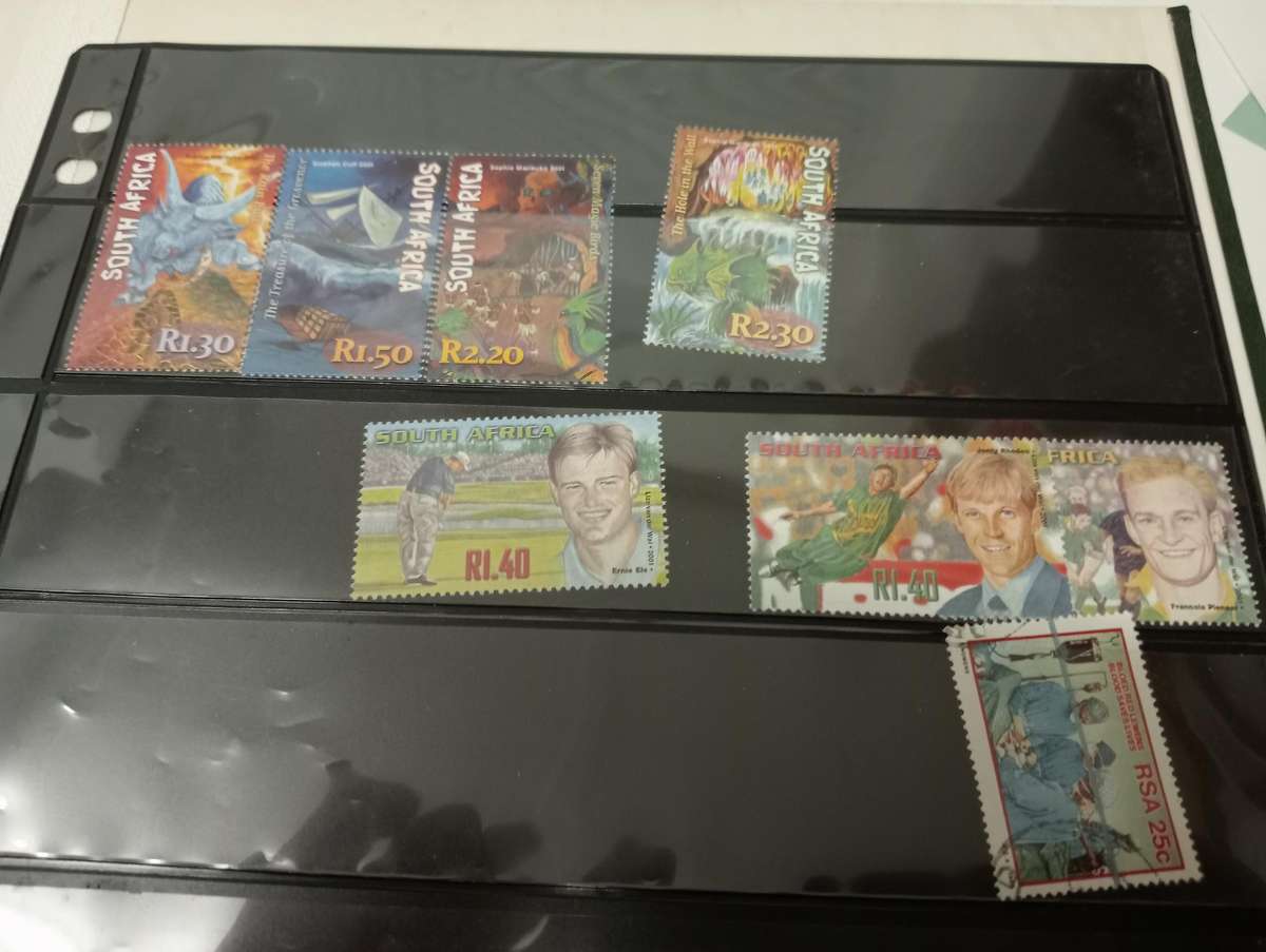 LOVELY CLEAN STOCK BOOK with odds and ends