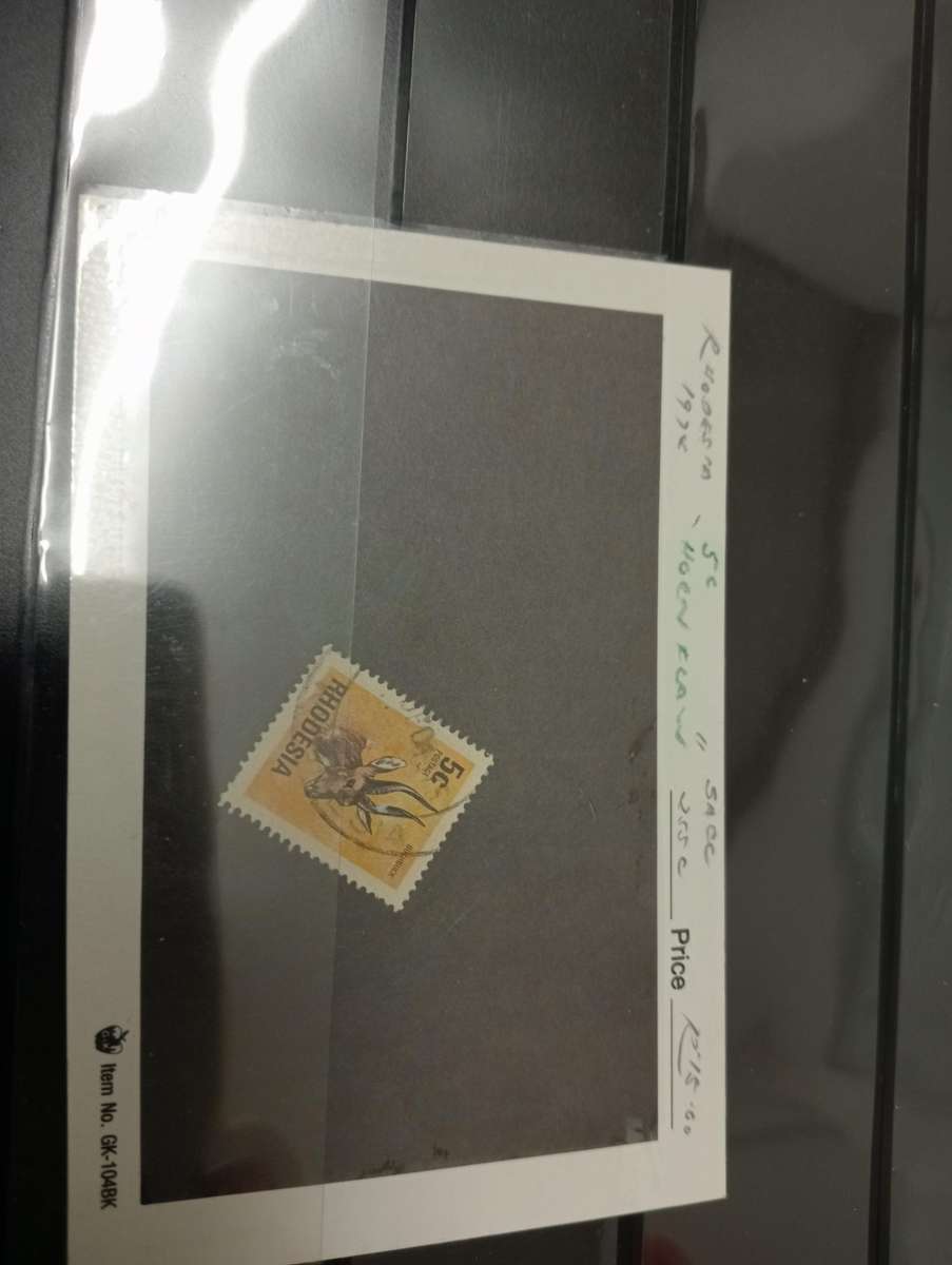 LOVELY CLEAN STOCK BOOK with odds and ends