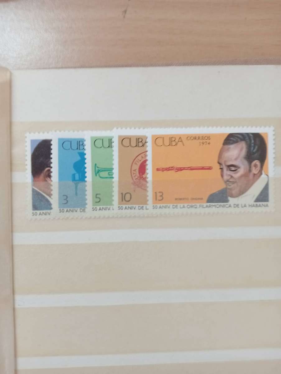 SMALL STOCK BOOK WITH UMM  THEMATIC SETS