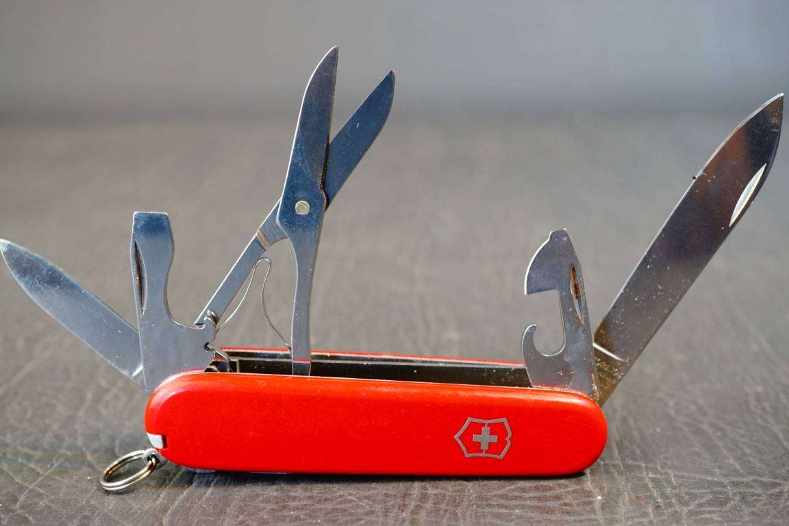 Vintage SWISS ARMY Victorinox Officier Suisse Pocket Knife 8 Tools Red **Good Condition**